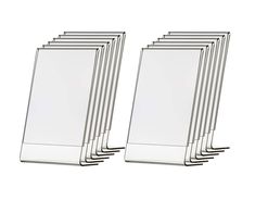 a set of six white frames sitting next to each other