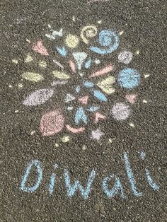 the sidewalk has chalk written on it and there is a flower in the middle that says owl