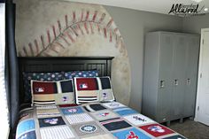 a baseball themed bed in a bedroom