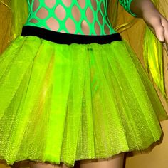 Tutu Style, Can Be Trimmed To Be A Cheeky Micro Mini Skirt. Uv Reactive- Glows Elastic Waist Band For Comfortable Fit Green Stretch Mini-length Bottoms, Stretch Skirt For Spring Costume Party, Green Stretch Skirt For Summer, Fun Festival Stretch Bottoms, Fun Stretch Bottoms For Festivals, Spring Costume Party Mini Skirt, Rave Skirt For Spring Party, Spring Rave Skirt For Party, Spring Rave Party Skirt