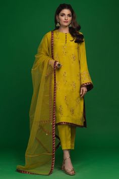 Reema (Three Piece)-Restocked – Zaaviay Semi-stitched Raw Silk Kurta With Dabka Work, Semi-stitched Gold Kurta With Naqshi, Semi-stitched Gold Chanderi Lawn Suit, Pista Green Chanderi Kurta With Resham Embroidery, Silk Lawn Suit With Traditional Drape For Festive Occasions, Traditional Drape Silk Lawn Suit For Festive Occasions, Gold Raw Silk Dupatta With Naqshi Detail, Gold Raw Silk Dupatta With Naqshi Embroidery, Gold Naqshi Raw Silk Dupatta