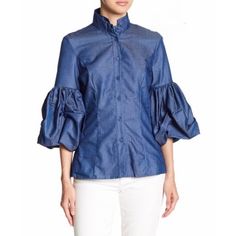 Our denim 3/4 puffy tacked sleeve button down blouse comes with a stand-up collar and feminine tailoring. Will look great with a skirt or trousers, or white jeans. 100% Cotton Dark Chambray Denim Runs slightly small, go up a size Kerschelle is wearing size S (32-26-41) Poet Blouse, Gold Blazer, Flare Maxi Skirt, How To Look Rich, Curvy Dress, Go Up, Sleeve Jacket, Button Down Blouse, Denim Flares