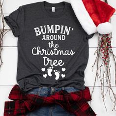 a t - shirt that says bumpin'around the christmas tree on it with a santa hat