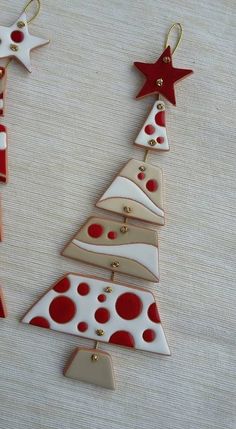 some red and white christmas tree ornaments on a table