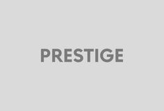 the words prestige are in grey and black letters on a gray background with an image of a