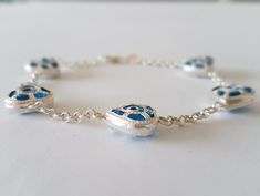 This Evil Eye Bracelet is 925 Sterling Silver. Length: 8 inches (20 cm)  Check for the same model Earrings: https://www.etsy.com/listing/687397128/evil-eye-earring-silver-925-sterling?ref=listings_manager_grid  Check for to see other models of bracelets Handmade Silver Evil Eye Bracelet, Handmade Sterling Silver Evil Eye Bracelet, Blue Sterling Silver Bracelet With Silver Clasp As Gift, Handmade Blue Evil Eye Bracelet In Sterling Silver, Handmade Sterling Silver Blue Evil Eye Bracelet, Handmade Blue Sterling Silver Evil Eye Bracelet, Evil Eye Craft, Evil Eye Bracelet Silver, Model Earrings