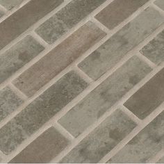 an image of a tile floor that looks like it is made out of cement blocks