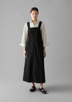 Denim Pinafore Dress | Black | TOAST Black Pinafore Dress Outfit, Pinafore Dress Outfit, Japanese Minimalist Fashion, Black Pinafore, Denim Pinafore Dress, Denim Pinafore, Mens Loungewear, Loungewear Women, Women Nightwear