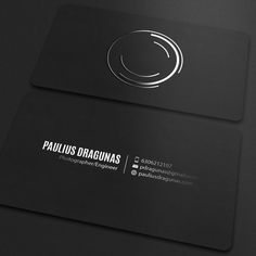 the business card is designed to look like it has a circular logo on it,