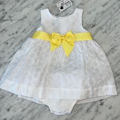 New Baby Cz Baby Girl Eyelet Sleeveless Dress. There Is A Wide Yellow Polka Dot Grosgrain Bow Around The Waist. It Is Lined And It Buttons Up The Back. The Bloomers Are Solid White. All Of My Items Are New With Tags. Yellow Baptism Dress For Summer, Yellow Summer Dress For Baptism, Fitted Yellow Dress For Baptism, Yellow Fitted Dress For Baptism, Baby Girls Dress, Yellow Polka Dot, White Eyelet