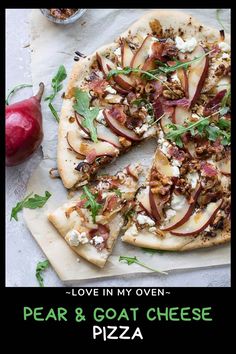 there is a pizza with many toppings on it and the words, love in my oven pear & goat cheese pizza