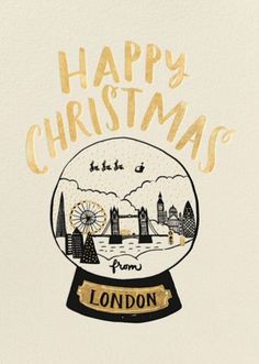 a snow globe with the words happy christmas written in gold on it and an image of london