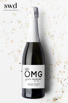 a bottle of omg champagne against a white background