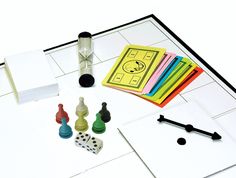 a board game with dices, cards and markers