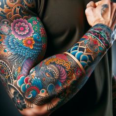 a man with many tattoos on his arms