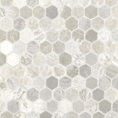 a white and gray hexagonal tile pattern