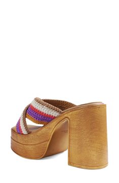 Colorful stitched stripes amplify the boho-chic style of a lofty wood-grain platform sandal that's sure to be a summery fave. 4 1/2" heel; 2" platform Synthetic upper/leather lining/synthetic sole Imported Multicolor Platform Clogs For Summer, Bohemian Beach Clogs For Spring, Bohemian Clogs For Beach And Spring, Bohemian Heels With Wooden Heel For Summer, Multicolor Heels With Wooden Heel For Summer, Bohemian Clogs For Beach And Summer, Bohemian Summer Heels With Wooden Heel, Summer Beach Clogs With Stacked Heel, Brown Summer Vacation Clogs