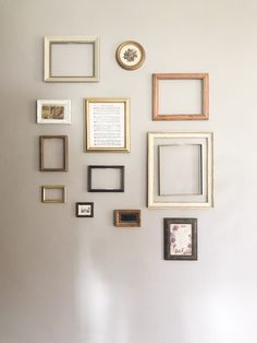 there are many different frames on the wall