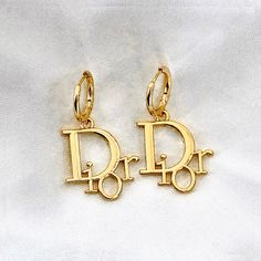 Product details: limited availability earring material: 24k gold over stainless steel charms measure approximately 16mm Pendants have been Chanel Gold Jewelry, Gold Luxury Jewelry, Expensive Things, Jewelry Designer, Vintage Designer, Designer Jewelry, Jewelry Gold, Dior Earrings, Preppy Jewelry