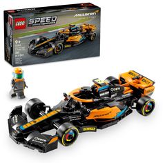 a lego race car is shown in front of the box