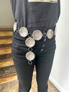 This is a very unique Calvin Martinez all silver concho belt. This is an amazing showpiece. Belt is an adjustable and reversible Native American Navajo hand made wearable piece of art. There are 12 round conchos in traditional 'old style' heavy gauge sterling silver, all with intricate detailed geometric designs, and joined together with hand wrought sterling silver links and a hook clasp which becomes hidden when worn. Can be turned on the reverse unstamped silver side as well for another look. Traditional Adjustable Concho Belt, Western Silver Embroidered Belt, Vintage Silver Embroidered Belt, Southwestern Adjustable Belts For Western-themed Events, Adjustable Southwestern Belt For Western-themed Events, Western Silver Belt Buckles For Festival, Southwestern Style Concho Belt For Festivals, Western Style Silver Belt Buckles For Festival, Adjustable Silver Belt