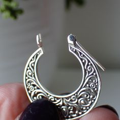 This is a beautiful pair of sterling silver filigree flat hoop earrings. They measure 1 inch in diameter. Small Hoop Filigree Jewelry Gift, Ornate Hoop Jewelry For Pierced Ears, Sterling Silver Hoop Jewelry With Intricate Design, Filigree Hoop Jewelry Gift, Filigree Hoop Jewelry As A Gift, Filigree Hoop Jewelry For Gift, Sterling Silver Open Circle Hoop Earrings For Pierced Ears, Crescent Jewelry With Intricate Design, Sterling Silver Filigree Hoop Jewelry