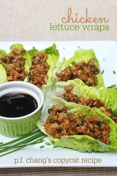 lettuce wraps with meat and sauce on a plate