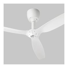 a white ceiling fan on a gray background with the light turned on and it's blades pointing upward