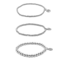 Silver Demi Bracelet Stack | Kinsley Armelle Gray Jewelry, White Bracelets, Custom Charms, White Jewelry, Metal Bracelets, Silver Roses, Bracelet Stack, Bead Art, Silver Beads