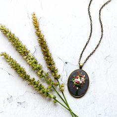 ARIA'S HAND EMBROIDERED BOUQUET NECKLACE Nothing brightens a day like flowers do. So here's some flowers you can wear everyday to bring some cheer to your day and outfit. It never wilts plus it's a conversation piece too! I hand embroider every intricate piece, and each pattern is hand drawn so no two necklaces will be exactly the same. This necklace is proudly handmade in the Philippines. - - - - - - - - - - - - - - - - - - - - - - - - - - - - - - - - - - - - - - - - - - - - - - - - - - - - - D Floral Embroidered Flower Jewelry For Weddings, Gold Jewelry With Floral Embroidery For Gift, Bohemian Jewelry With Floral Embroidery For Gifts, Multicolor Embroidered Bohemian Necklace, Hand Embroidered Pendant, Hand Embroidered Necklace, Bohemian Embroidered Pendant Necklace, Wedding Hands, Unique Gifts For Mom