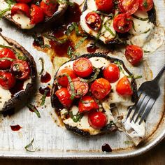 a pan filled with grilled eggplant and cherry tomatoes