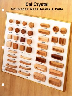 a display case with wooden knobs and pulls on the wall above it is labeled cal crystal unfinished wood knobs & pulls