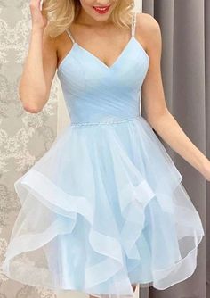 Looking For One Perfect Homecoming Dress? This Homecoming Dress is made-to-order by professional tailors. Available In Over 60 Colors. Regular sizes 2 to 16 and plus sizes 14W to 26W. Custom size is also available.More details:Silhouette:A-line.Neckline:V Neck.Sleeve:Sleeveless.Wrap:No.Trend Collections:Open Back,Formal,Fitted.Back Style:Lace Up.Embellishment:Beading,Pleated.Size:Plus,General.Fabric:Tulle.Length:Short/Mini.Shown Color:Sky Blue.Fully Lined:Yes.Built_In Bra:Yes.Boning:Yes.Straps:S Light Blue Homecoming Dress, Prom Dresses Short Blue, Blue Homecoming Dress, Mini Homecoming Dresses, Tulle Homecoming Dress, Blue Homecoming Dresses, Short Homecoming Dress, Short Prom Dress, Custom Size Dresses