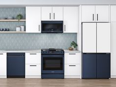 a kitchen with white cabinets, blue appliances and wood flooring is seen in this image