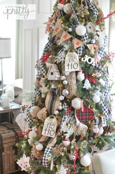 a christmas tree decorated with burlocks and ornaments