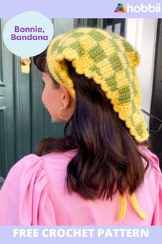 a woman wearing a yellow knitted hat with the words free crochet pattern on it