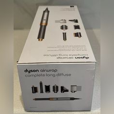 100% Authentic! New In Open Box Dyson Airwrap Complete Long Diffuse Multi-Styler For Curly And Coily Hair The New Dyson Airwrap Complete Long Diffuser Is Engineered For Curly And Coily Hair. New Diffuser And Large Round Volumizing Brush Attachment. Dry, Curl, Shape, Smooth And Hide Flyaways With No Heat Damage. - Dries And Styles Simultaneously Using The Coanda Effect, Not Heat Damage - Six Versatile Attachments Engineered For Styling Curly And Coily Hair - 2-In-1 Coanda Smoothing Dryer Dries, S New Dyson Airwrap, Dry Curl, Hair Color Silver, Dyson Airwrap Complete, Dyson Airwrap, Coily Hair, Heat Damage, No Heat, Open Box