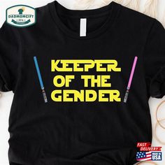 a t - shirt that says keeper of the genderer with two lightsabes on it