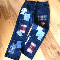 Plaid flannel patchwork jeans, women's size 16 medium, upcycled reworked distressed jeans with denim and plaid flannel patches in navy and burgundy.  These jeans would make a great fall or winter outfit for anyone who likes fun, unique clothing.   (WANT TO SEE MORE FROM THIS COLLECTION? Type PLPJ in this store's search field.) DETAILS: Size:  Women's size 16 medium Brand:  Lee Materials:  99% cotton, 1% spandex MEASUREMENTS: Waist:  33 inches Hips:  45 inches Inseam:  31 inches Front Rise:  12-1/2 inches Back Rise:  16 inches Circumference bottom of leg:  18 inches Be sure to check the size and measurements.  Sizing for clothing brands is often different! Hint:  To be sure this item will fit, lay your favorite pants/jeans out flat and take measurements of the same areas listed above. These Patchwork Jeans Outfit, Funky Pants, Patchwork Jeans, Upcycled Clothing, Upcycled Fashion, 1980s Fashion, Unique Clothing, Clothing Brands, Refashion Clothes