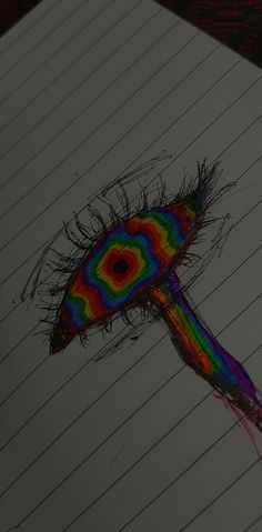 a drawing of a multicolored toothbrush on lined paper