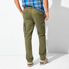 These St. John's Bay men's mid-rise cargo pants will be a year-round casual style essential. Made from stretch-cotton, this straight-leg style has a button-zip closure and 5-pocket tailoring. Wear them with a polo shirt or tee. Front Style: Flat FrontFeatures: Belted, Stretch FabricClosure Type: Button & ZipperFit: Straight FitPockets: 2 Cargo Side Pockets, 2 Back Button Pockets, 2 Side Slip PocketsRise: Mid RiseFiber Content: 98% Cotton, 2% SpandexFabric Description: CanvasInseam: 30 InLeg Styl Military Style Cotton Jeans With Side Pockets, Casual Cotton Work Pants With Flap Pockets, Green Cotton Cargo Jeans With Flap Pockets, Utility Cotton Chinos With Cargo Pockets, Pants Cargo, Cargo Pant, Pants Men, Fashion Essentials, Stretch Cotton