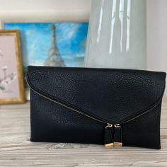 Never Worn Beautiful Black Color. Can Be Worn As Clutch, Shoulder Bag, And Crossbody Clutch Bag With Fold Over Clasp For Everyday Use, Everyday Clutch Bag With Fold Over Clasp, Everyday Clutch With Fold Over Clasp, Travel Pouch Bag With Fold Over Clasp, Black Everyday Clutch With Fold Over Clasp, Black Clutch With Fold Over Clasp For Everyday Use, Black Bag With Fold Over Clasp For Everyday Use, Black Clutch, Wristlets