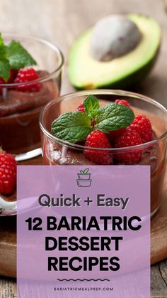 two desserts with raspberries and mint leaves in them on a wooden plate