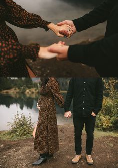 two people holding hands while standing next to each other on a dirt road near water