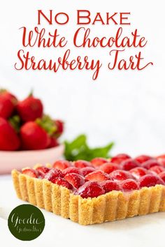 no bake white chocolate strawberry tart on a table with strawberries in the background