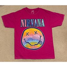 Nwot Forever 21 Nirvana Rainbow Smiley Pink Tee Features/Description: Hot Pink T-Shirt. Front Of The Shirt Has Large Nirvana Rainbow Smiley Graphics. Condition: New, Without Tags. No Damages Or Stains. Shirt Has Never Been Worn Or Washed. Measurements: Garment Is Labeled Size L/Xl. Please See Measurements To Determine An Accurate Fitting On You. Measurements Are Taken Laying Flat And Are Approximations: Chest: 20.5” Length: 27.5” Color Of The Garment May Appear Different Due To Lighting And Scre Forever 21 Relaxed Fit Short Sleeve T-shirt, Forever 21 Graphic Tee For Streetwear, Forever 21 Relaxed Fit T-shirt For Summer, Forever 21 Relaxed Fit Summer T-shirt, Forever 21 Graphic Print Crew Neck T-shirt, Forever 21 Letter Print T-shirt For Streetwear, Forever 21 Short Sleeve Graphic T-shirt, Forever 21 Graphic Print T-shirt For Streetwear, Forever 21 Graphic Tee For Spring