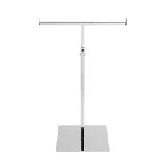 a white table with a metal pole on it's top and one arm extended