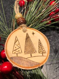 a wooden ornament hanging from a christmas tree