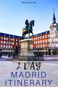 a statue in front of a building with the words i day madrid itinerary