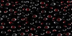 many red and black circles on a black background